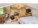 Bedroom features a comfortable sitting area, a TV, and ample closet space at 120 Majesty Ln, Fayetteville, GA 30215