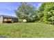 A backyard with a wooden deck at 130 Belmont Farms Dr, Ellenwood, GA 30294
