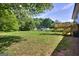 A spacious backyard with mature trees at 130 Belmont Farms Dr, Ellenwood, GA 30294
