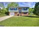 Charming brick home with a well-manicured lawn and a two-car garage, perfect for Gathering living at 130 Belmont Farms Dr, Ellenwood, GA 30294