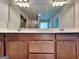 Modern bathroom with a double sink vanity and large mirror at 3733 Upland Dr, Mcdonough, GA 30253