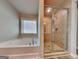 Spacious bathroom with separate tub and glass shower at 3733 Upland Dr, Mcdonough, GA 30253