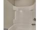 Bathroom features white tile and a tub-shower combo at 3733 Upland Dr, Mcdonough, GA 30253