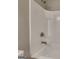 Bathroom featuring a white tiled shower with a showerhead and faucet at 3733 Upland Dr, Mcdonough, GA 30253