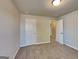 Bedroom featuring fresh paint, carpeted floors, and two doors at 3733 Upland Dr, Mcdonough, GA 30253