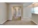 The open hall has neutral carpet and access to rooms at 3733 Upland Dr, Mcdonough, GA 30253