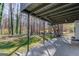 Spacious backyard with a concrete patio, perfect for outdoor entertaining at 5284 Silver Creek Sw Dr, Lilburn, GA 30047
