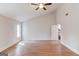 Spacious bedroom with wood floors, ceiling fan, and natural light at 5284 Silver Creek Sw Dr, Lilburn, GA 30047