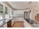 Modern kitchen with granite countertops and stainless steel appliances at 5284 Silver Creek Sw Dr, Lilburn, GA 30047
