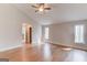 Large primary bedroom with wood floors, ensuite bathroom and plenty of natural light at 5284 Silver Creek Sw Dr, Lilburn, GA 30047