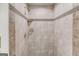Shower stall with tile surround and built in shelf at 5284 Silver Creek Sw Dr, Lilburn, GA 30047