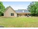 Spacious home with large backyard and patio area at 563 Deadwood Trl, Locust Grove, GA 30248