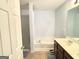Bright bathroom with a separate shower and tub, and a double sink vanity at 3311 Thornbridge Dr, Powder Springs, GA 30127