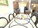 Spacious dining area open to the kitchen, featuring a stylish table and access to the living area at 3311 Thornbridge Dr, Powder Springs, GA 30127