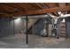 Unfinished basement featuring open layout and stairs at 6286 Saddlewood Dr, Lithonia, GA 30058