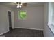 Bedroom with closet and new flooring at 6286 Saddlewood Dr, Lithonia, GA 30058