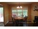 Charming eat-in kitchen with a view, perfect for casual dining and enjoying the natural light at 25 Lake Charles Ct, Covington, GA 30016