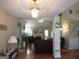 Spacious living room featuring hardwood floors and a cozy fireplace, creating a warm and inviting atmosphere at 25 Lake Charles Ct, Covington, GA 30016