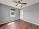 Bedroom featuring hardwood floors, neutral paint, natural light and standard closet at 72 S Bethany Rd, Mcdonough, GA 30252