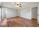 Bedroom featuring hardwood floors, neutral paint, ceiling fan and natural light at 72 S Bethany Rd, Mcdonough, GA 30252