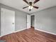 Bedroom featuring hardwood floors, neutral paint, ceiling fan and natural light at 72 S Bethany Rd, Mcdonough, GA 30252
