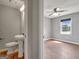 Bedroom featuring hardwood floors, neutral paint, ceiling fan and natural light at 72 S Bethany Rd, Mcdonough, GA 30252