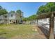 Expansive backyard featuring a hammock and ample space for outdoor activities at 12 Blackfoot Trl, Sharpsburg, GA 30277