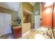 Bright bathroom featuring granite countertops, double sinks, and a tiled shower at 12 Blackfoot Trl, Sharpsburg, GA 30277