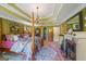 Large main bedroom with fireplace, detailed trim and ample natural light at 12 Blackfoot Trl, Sharpsburg, GA 30277