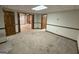 Spacious unfinished basement area with door and garage access; awaiting customization at 4081 Jodeco Rd, Stockbridge, GA 30281