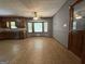 Dining area adjacent to the kitchen, featuring a bay window, ceiling fan and tile floors at 4081 Jodeco Rd, Stockbridge, GA 30281
