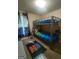 ' room featuring a bunk bed and play area with music-themed curtains at 6153 Oakley Rd, Union City, GA 30291