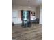 Cozy dining area offers a table with four chairs, natural light and modern flooring at 6153 Oakley Rd, Union City, GA 30291