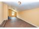 Attic room with neutral paint, simple window, and sloped ceiling at 26 Cannongate Rd, Sharpsburg, GA 30277