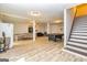Finished basement with open layout, ping pong table, pool table, and neutral color palette at 26 Cannongate Rd, Sharpsburg, GA 30277