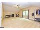 Large bonus room with carpet, pool table, exercise bike, and windows for natural light at 26 Cannongate Rd, Sharpsburg, GA 30277