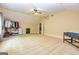 Expansive bonus room with carpet, pool table, clothing rack, and access to other rooms at 26 Cannongate Rd, Sharpsburg, GA 30277