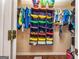 Organized closet with hanging rods, storage shelves, and labeled bins for clothes and accessories at 26 Cannongate Rd, Sharpsburg, GA 30277