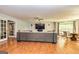 Large living room with comfortable seating and a mounted television at 26 Cannongate Rd, Sharpsburg, GA 30277