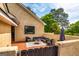 Inviting outdoor patio featuring comfortable seating and a fire pit at 26 Cannongate Rd, Sharpsburg, GA 30277