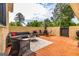 Relaxing brick patio with comfortable seating, great for entertaining at 26 Cannongate Rd, Sharpsburg, GA 30277