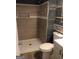 Bathroom with tiled shower, and grey accents at 4616 Hamlet Se Walk, Conyers, GA 30094