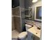 Bathroom with tiled shower, and grey accents at 4616 Hamlet Se Walk, Conyers, GA 30094