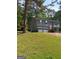 Charming two-story home with a two-car garage and well-maintained front yard at 4616 Hamlet Se Walk, Conyers, GA 30094