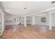 Unfinished basement space with hardwood flooring and natural light, perfect for customization at 1620 Saddle Ridge Way, Sandy Springs, GA 30350