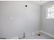 Bathroom featuring unique window providing natural light and plumbing fixtures, ready for customization at 1620 Saddle Ridge Way, Sandy Springs, GA 30350