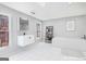 Stylishly renovated bathroom featuring modern vanity, shelf storage, and soaking tub at 1620 Saddle Ridge Way, Sandy Springs, GA 30350