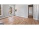 An airy bedroom space with hardwood floors and a window providing natural light at 1620 Saddle Ridge Way, Sandy Springs, GA 30350