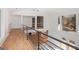 Bright foyer features hardwood floors, views to outdoors, and contemporary metal railing at 1620 Saddle Ridge Way, Sandy Springs, GA 30350