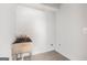 Functional laundry room with a deep utility sink and tiled flooring, ideal for practical cleaning tasks at 1620 Saddle Ridge Way, Sandy Springs, GA 30350